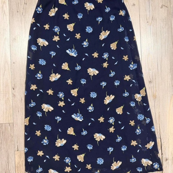 Dresses & Skirts - Navy blue floral maxi skirt with a flowy, boho vibe